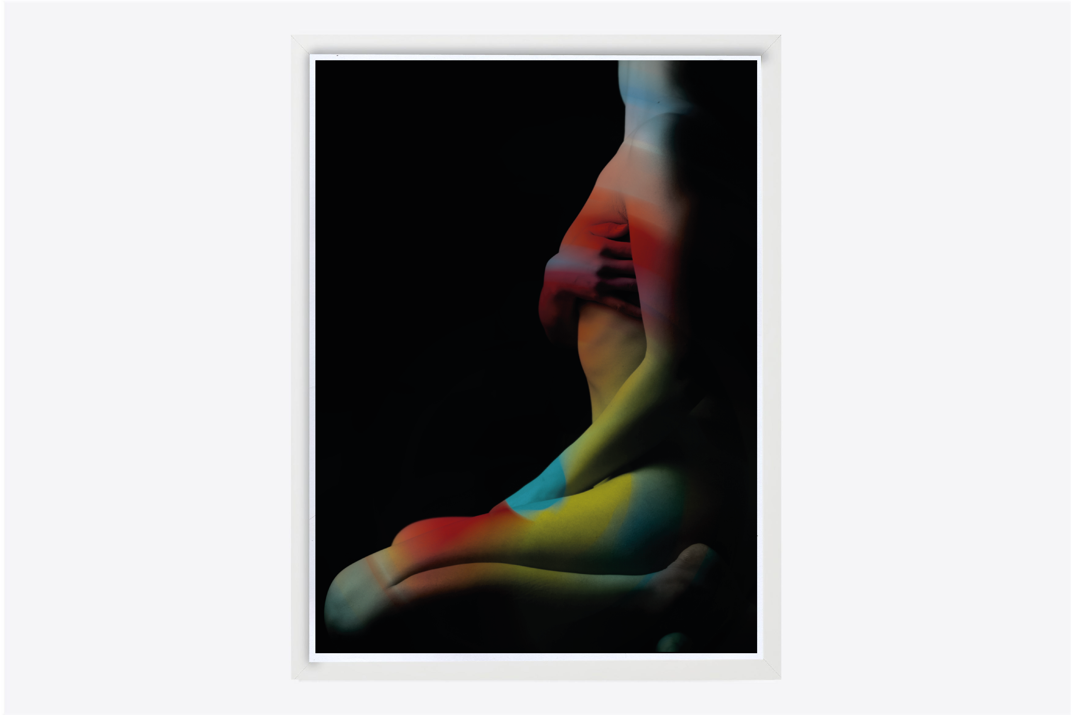 "C-print titled 'Nudus Lux VI' by British contemporary artist Elvis Ellis, known as Elvs. Measuring 105cm x 80cm and limited to an edition of 100, this striking work features paint projected onto a nude still-life model, captured in a moment of vibrant abstraction. The piece draws on the inventive genius of artists like Picasso, Banksy, Damien Hirst, and Jeff Koons, merging classical themes with a bold, contemporary approach. 'Nudus Lux VI' reinterprets the traditional nude through a modern lens, blending the raw human form with the dynamic interplay of light and color. This artwork, with its roots in Bristol, NYC, and London, embodies the cutting-edge spirit of today's art scene, making it a standout addition to any prestigious collection."